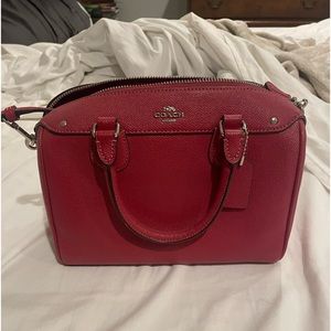 Dark pink coach cross body purse